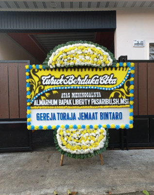 Papan Bunga Duka di Sarapat
